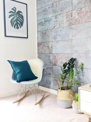 a living room with a chair and potted plants at Stylish 2 bedroom Apartment / FREE Gated Parking in Glasgow