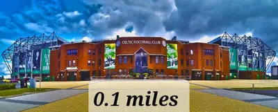 a building with a sign that reads o miles at Stylish 2 bedroom Apartment / FREE Gated Parking in Glasgow
