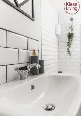 a white sink with a faucet in a bathroom at Garturk Apartment by Klass Living Coatbridge in Coatbridge