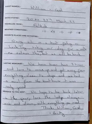 a letter written in cursive handwriting on at Milton Bay Luxury lodge wrapped in exceptional scenery in Morenish