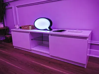 a purple room with a table with a mirror on it at 3 bed apartment in the heart of westend of Glasgow in Glasgow