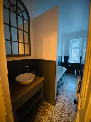 a bathroom with a sink and a bath tub at Upper Villa, Tighnabruiach, Argyll & Bute in Tighnabruaich