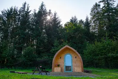 a small chapel in the middle of a field at Luxury Rural Ayrshire Glamping Pod in Dalmellington