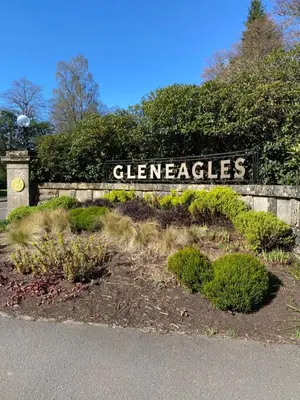 a sign for acleavenges sign in a garden at Gleneagles Holiday Home in Auchterarder