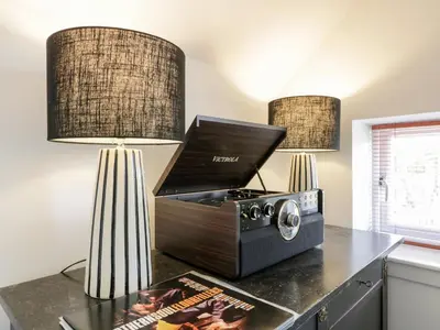a kitchen with two lamps and a radio on a counter at Gate Lodge, House of Binns in Linlithgow