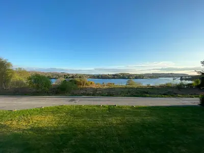 a view of a body of water from a park at No 2 The Cairns, Unwind in Style in Oban