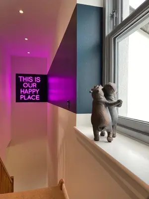 a couple of animals sitting on a window sill at No 2 The Cairns, Unwind in Style in Oban