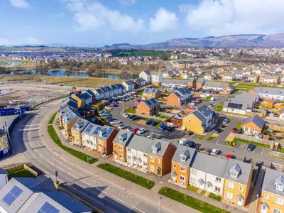 an aerial view of a town with a street at Modern 3-Bed Family Home Near Glasgow Airport in Bishopton