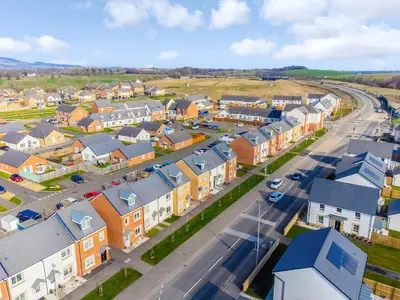 an aerial view of a small town with houses at Modern 3-Bed Family Home Near Glasgow Airport in Bishopton