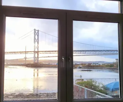 a view of a bridge from a window at Three Bridges Waterfront in North Queensferry