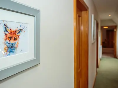 a painting of a fox on a wall at Kringlands in Stranraer