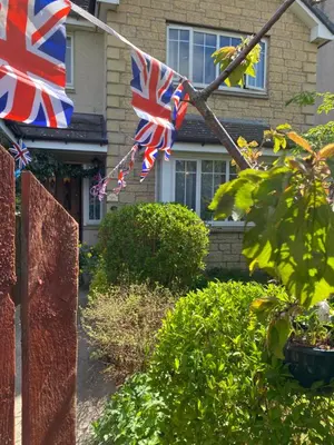 two british flags flying in front of a house at Caledonia House in Rosyth