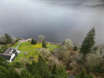 an aerial view of a body of water at WATERSIDE 3 BED COTTAGE, HOT TUB, SAUNA, PVT BEACH in Arrochar