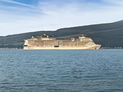 a cruise ship sitting in the water at Strathclyde Cottage North in Skelmorlie