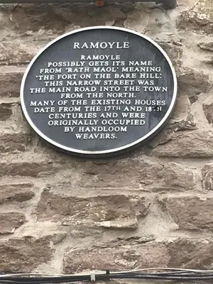 a plaque on the side of a stone wall at 1Bed Golfhill Cottage in Dunblane