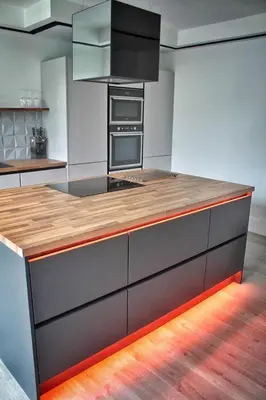 a kitchen with a wooden counter top in a kitchen at Laburnam Villa - Luxury 4 bedroom accommodation in the heart of Killin in Killin