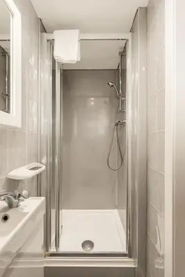 a bathroom with a shower and a sink at Central Studio Near Usher Hall & Edinburgh Castle in Edinburgh