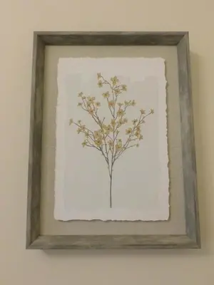 a painting of a tree in a frame on a wall at Beautiful & spacious 2 bed apt in Glasgow West End in Glasgow