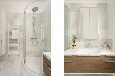 a white bathroom with a sink and a shower at Heriot Bridge Hideaway by Calton Living in Edinburgh