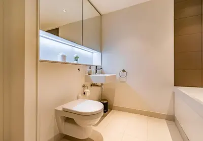 a bathroom with a toilet and a sink at Simpsons Loan - 428 in Edinburgh