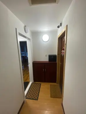 an empty hallway with a door and a room at cosy 1 bed flat Largs in Largs