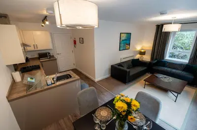an aerial view of a living room and a kitchen at Balvenie Apartment in Oban