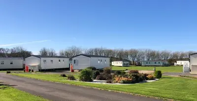 a row of mobile homes on the side of a road at Turnberry Holiday Home in Turnberry