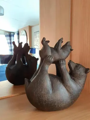 a statue of two rubber ducks sitting on a table at Sycamore Lodge Auchterarder in Auchterarder