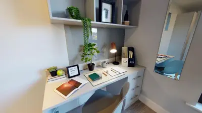 an office with a desk and a mirror at Studios and Ensuite Bedrooms with Shared Kitchen at Fountainbridge in Edinburgh in Edinburgh