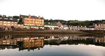 a town with buildings and a body of water at An Cuilidh in Port Bannatyne