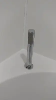 a microphone sitting on top of a white floor at Dunoon Gourock Inverkip Apartment in Gourock