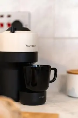 a coffee pot sitting on top of a coffee maker at Finnieston 1-Bed - Walk to Hydro & Bars - Sleeps 2 in Glasgow