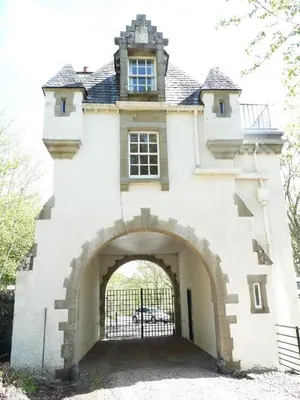 an entrance to a building with a gate at Gatehouse, Bridge of Balgie, Glenlyon in Bridge of Balgie