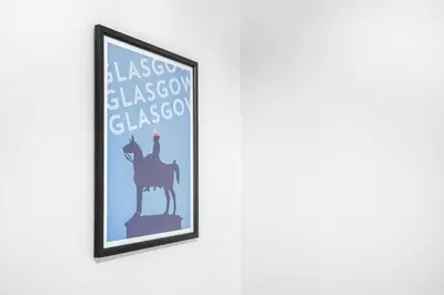 a framed poster of a person on a horse on a wall at I'm Your Host - Bridgeton House in Glasgow