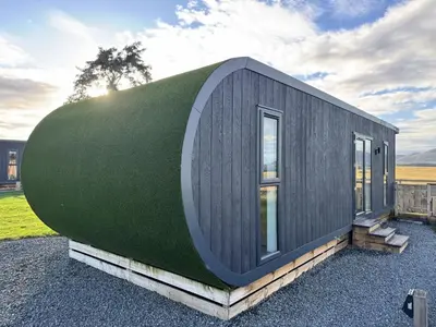 a house with a green roof at South Black Hill in Penicuik