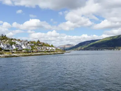 a view of a river with houses and mountains at Mars Hill Lower in Dunoon