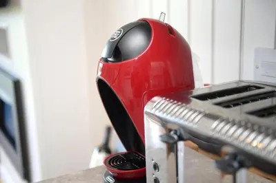 a red iron is sitting on top of a counter at Lomond View in Langbank